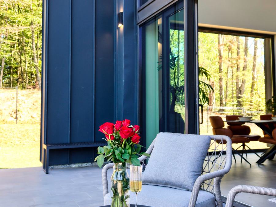 Terrace chairs by the glass wall